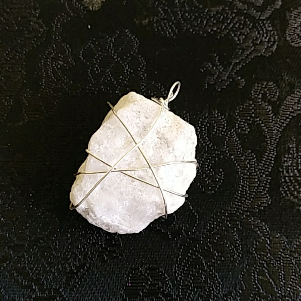 Handcrafted wire wrapped white healing stone penda